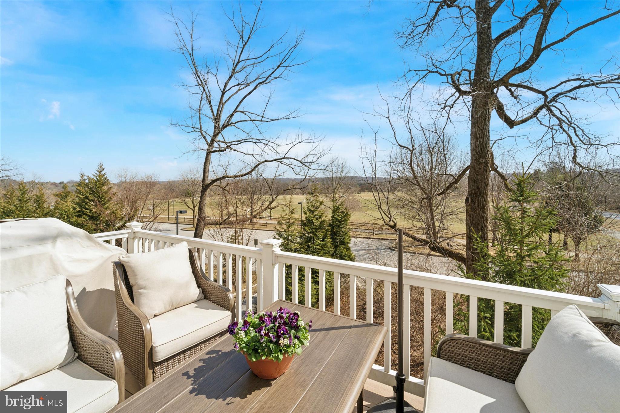 34 Parkview Cir. Wayne, PA 19087 - Photo 10 of 55 a view of a balcony with couches and wooden floor