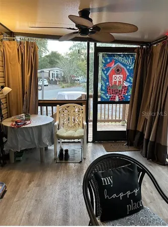 a room with furniture and a flat screen tv