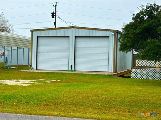 a view of a kitchen with a sink