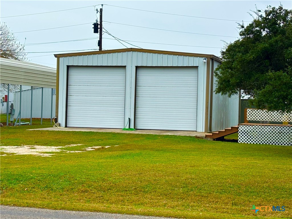 a view of a kitchen with a sink