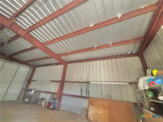 a view of outdoor space with trees all around