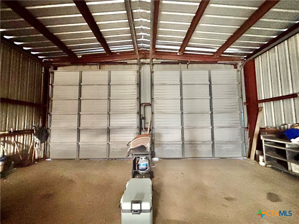 55 Scarlett Street Port O'Connor, TX 77982 - Photo 2 of 46 a view of a garage room