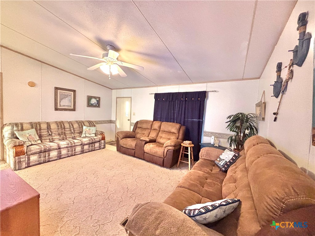 55 Scarlett Street Port O'Connor, TX 77982 - Photo 37 of 46 a living room with furniture and a couch
