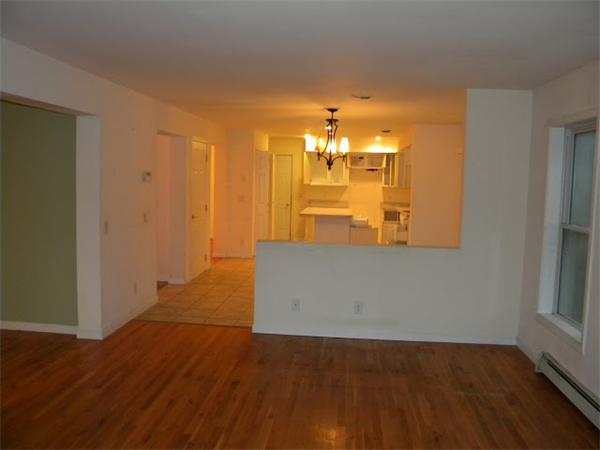 96 Sarah Sherman Road Rochester, MA 02770 - Photo 6 of 6 wooden floor in an empty room with a window