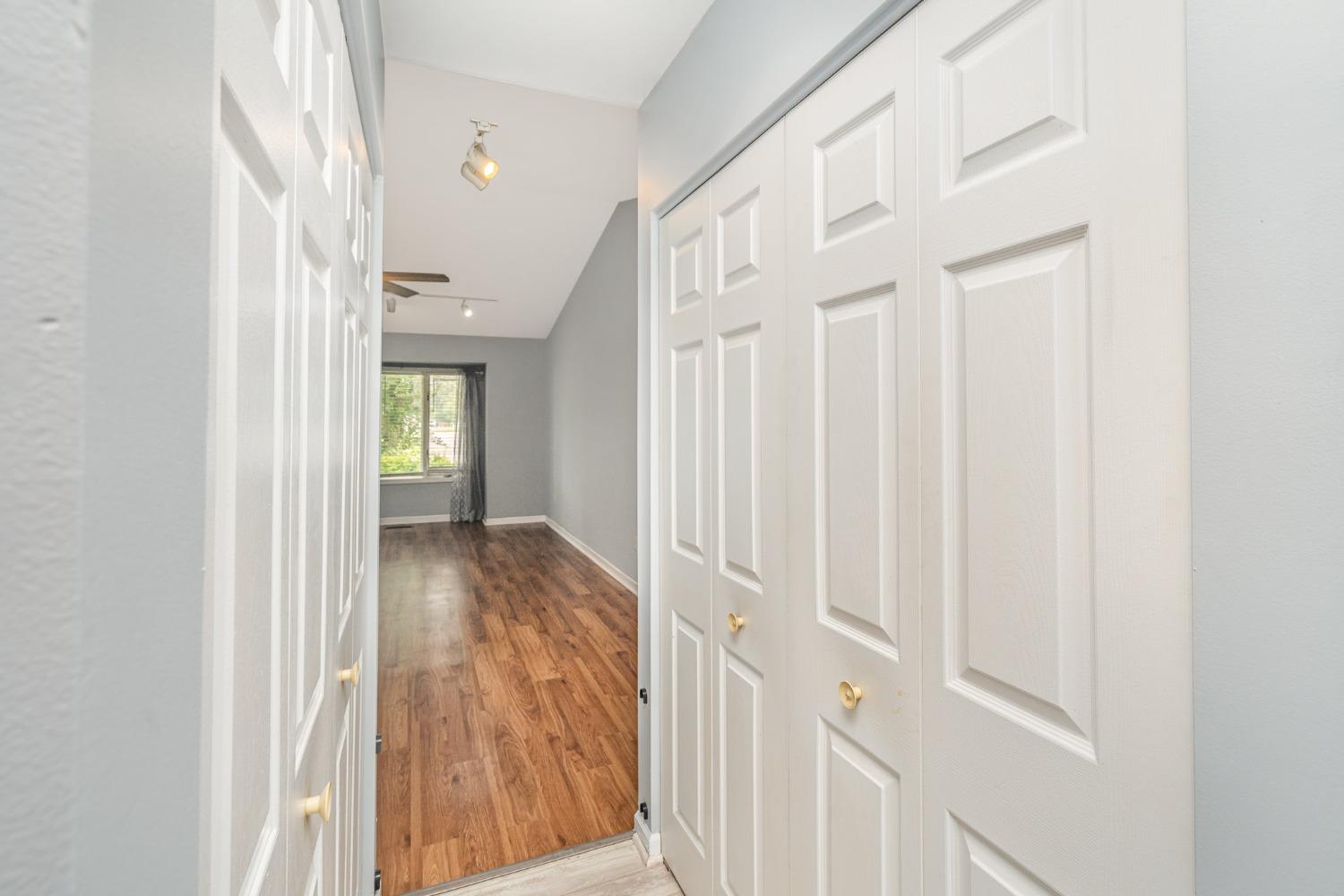 225 Clinton Street Lowell, IN 46356 - Photo 13 of 27 a view of a hallway with wooden floor and entryway