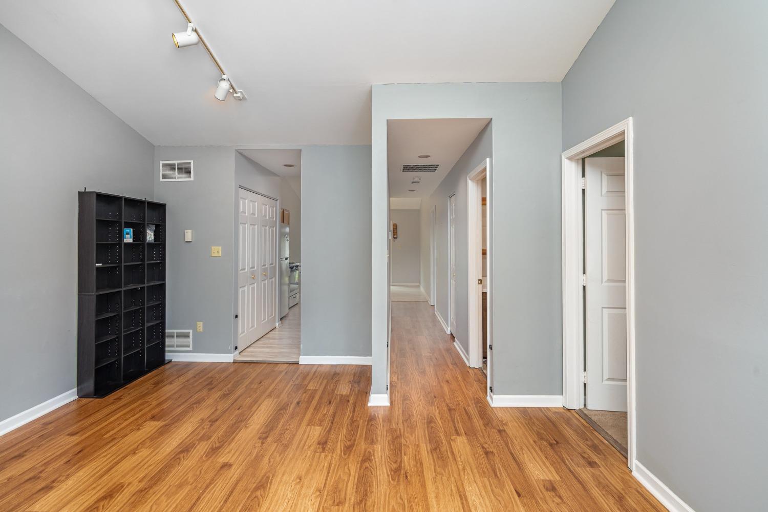 225 Clinton Street Lowell, IN 46356 - Photo 5 of 27 a view of a room with wooden floor and closet