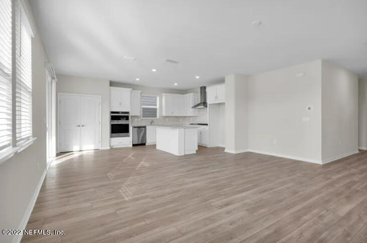 674 Blind Oak Cir Street St. Augustine, FL 32095 - Photo 11 of 21 a view of kitchen with wooden floor