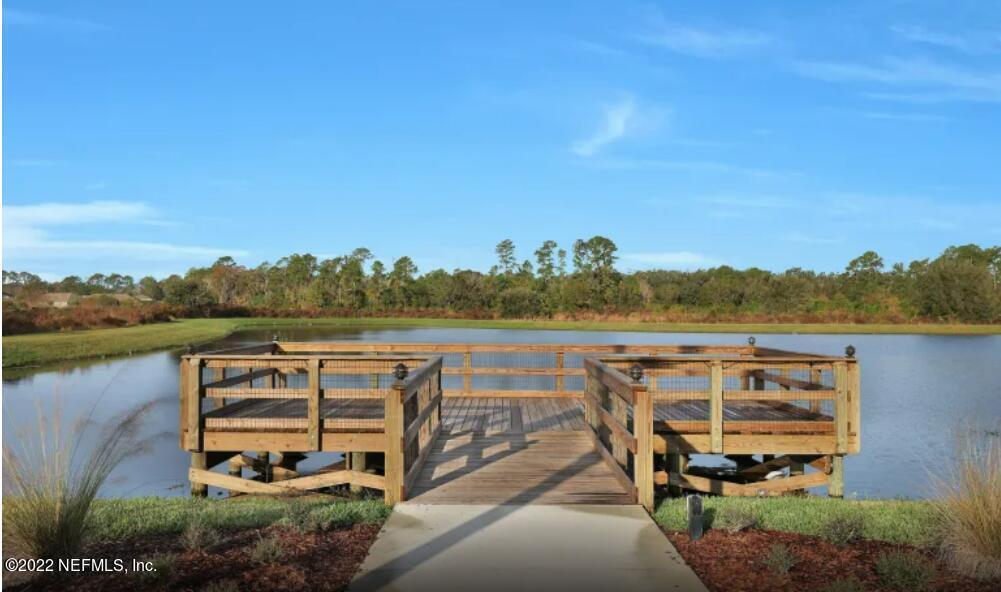 674 Blind Oak Cir Street St. Augustine, FL 32095 - Photo 13 of 21 a view of a lake with outside a garden
