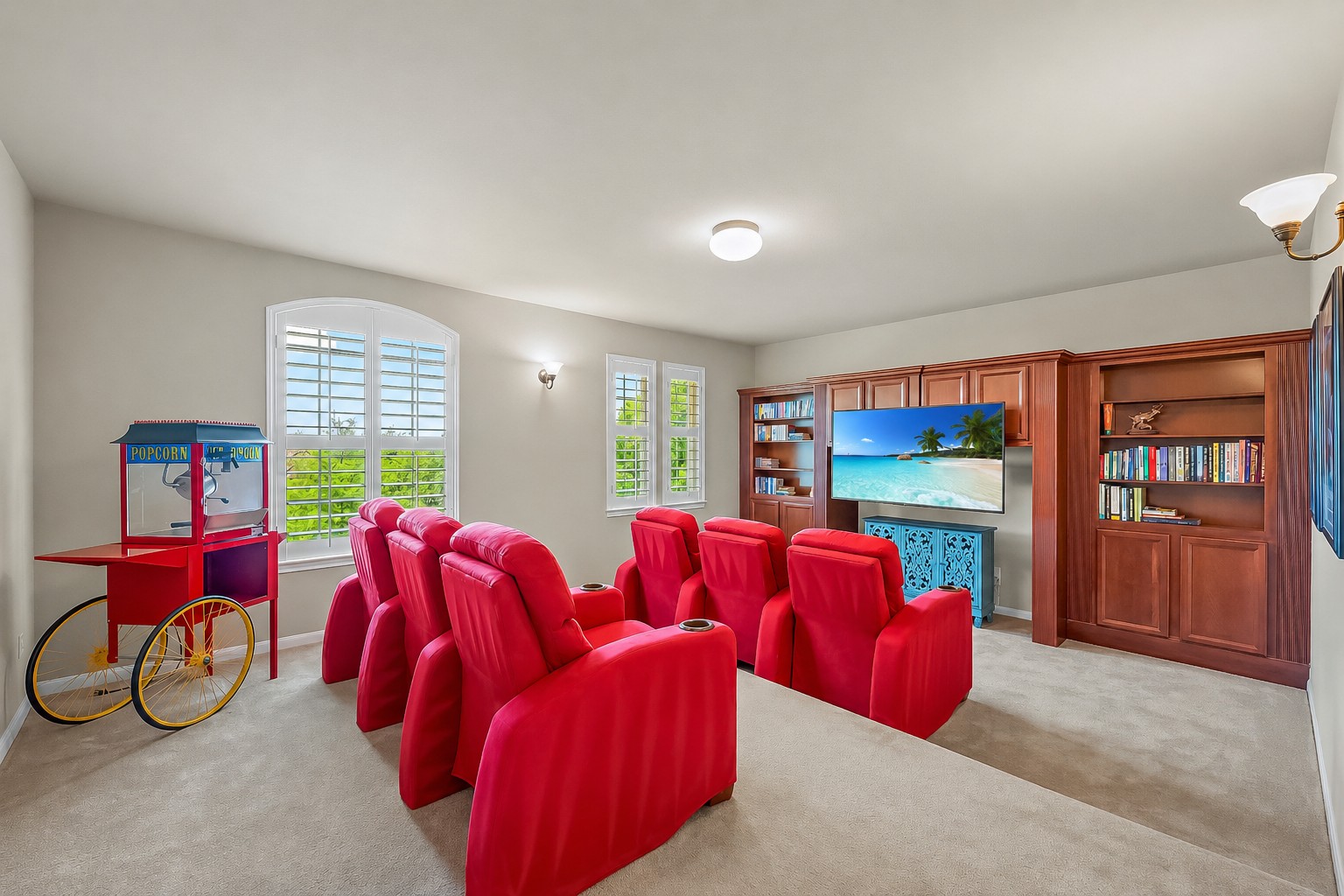 14608 Spillman Ranch Loop Austin, TX 78738 - Photo 25 of 31 a living room with furniture and a flat screen tv