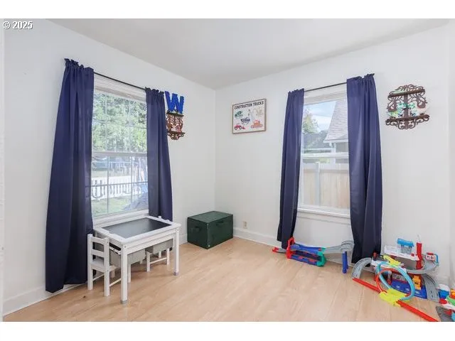 a balcony with a bench and a chair