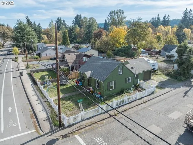 a aerial view of a house with outdoor space