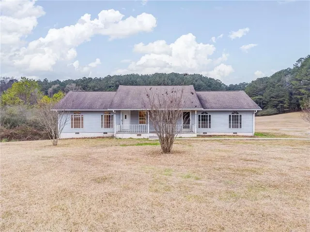 an empty room with a empty space and a window