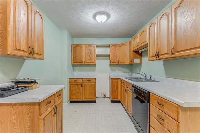 a view of a big room with carpet