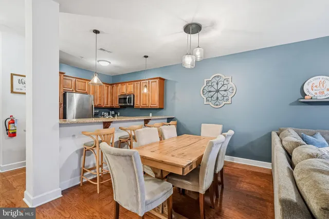 a view of a dining room with furniture