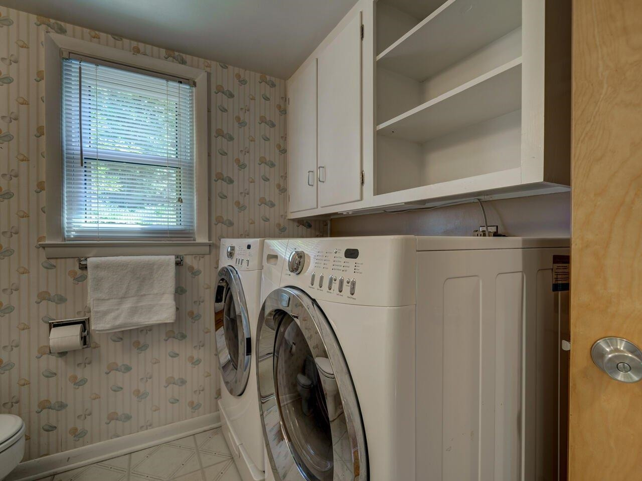 1233 Kingston Ridge Road Cary, NC 27511 - Photo 20 of 30 Laundry area in lower level full bath