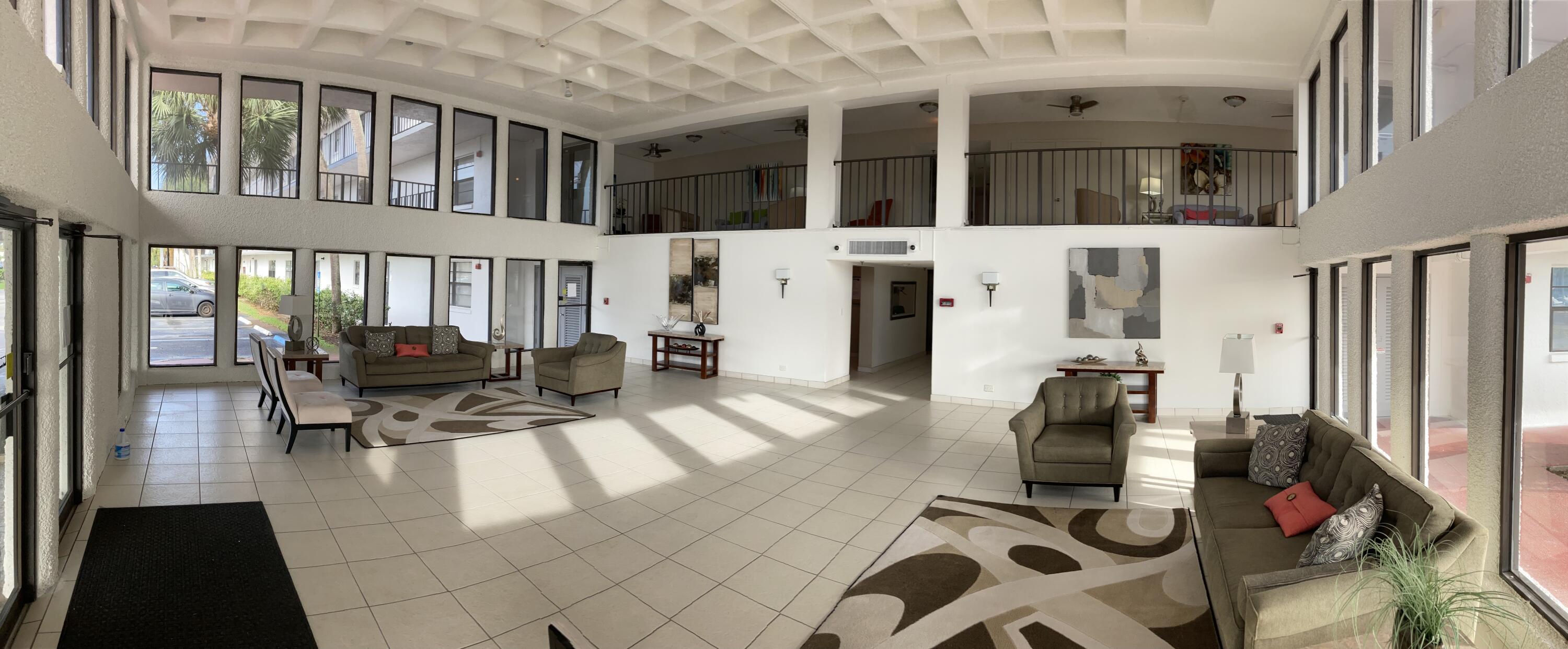 9233 Southwest 8th Street, Unit 305 Boca Raton, FL 33428 - Photo 37 of 48 9233 Newly Painted Lobby Pano