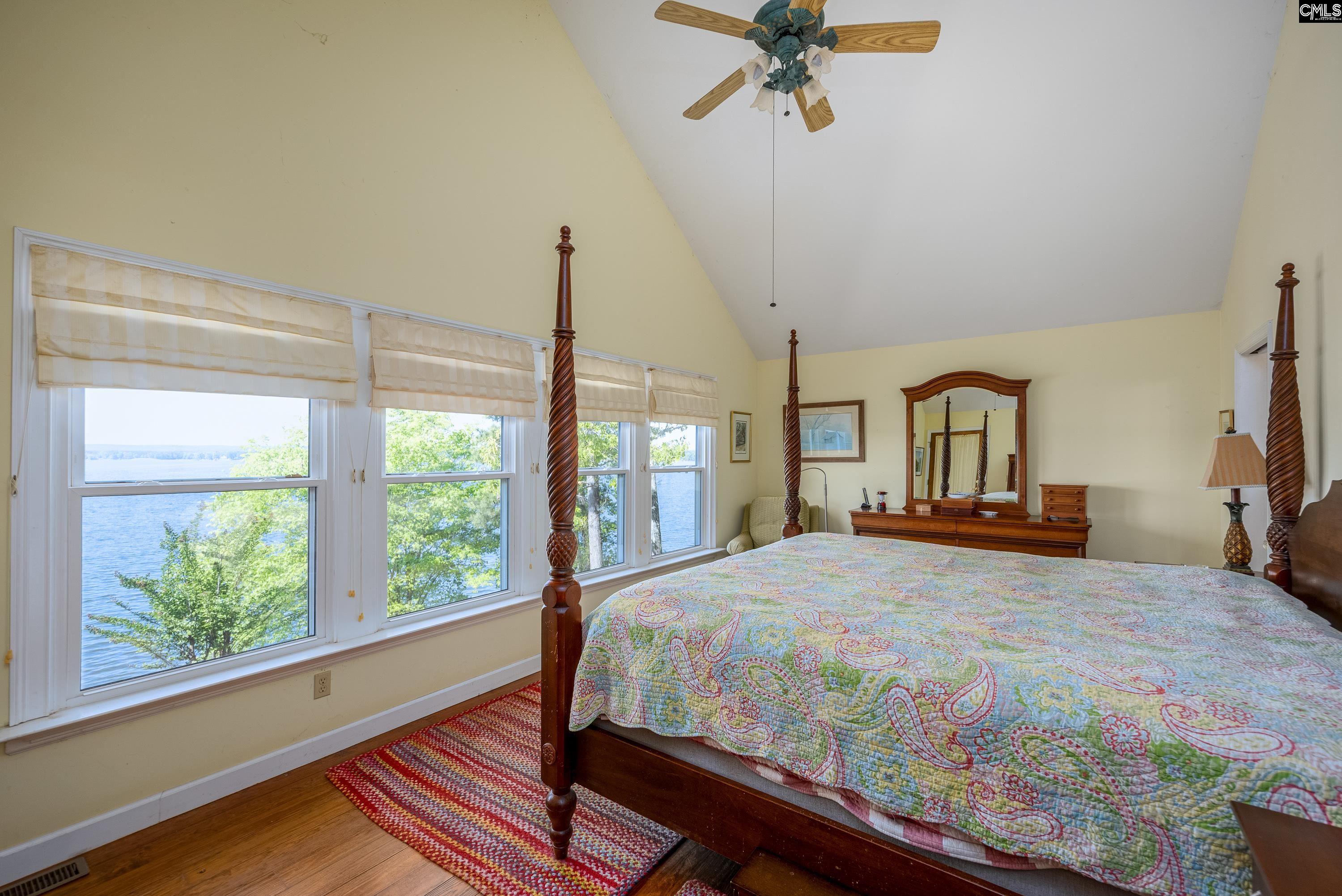2577 Harbor View Road Camden, SC 29020 - Photo 22 of 42 a bedroom with a large bed and a window