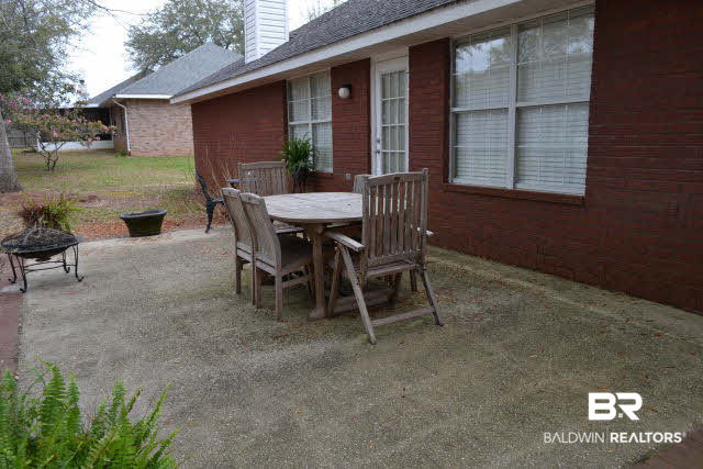 12191 Verona Court Foley, AL 36535 - Photo 16 of 21 The rear patio gets plenty of afternoon sun from the large water oaks in the back yard