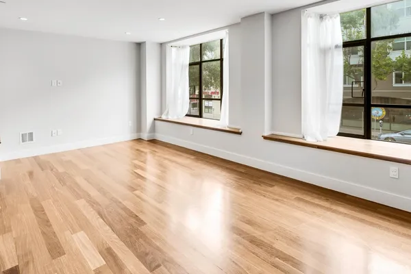 a view of an empty room and window