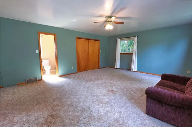 a furnished livingroom with a window