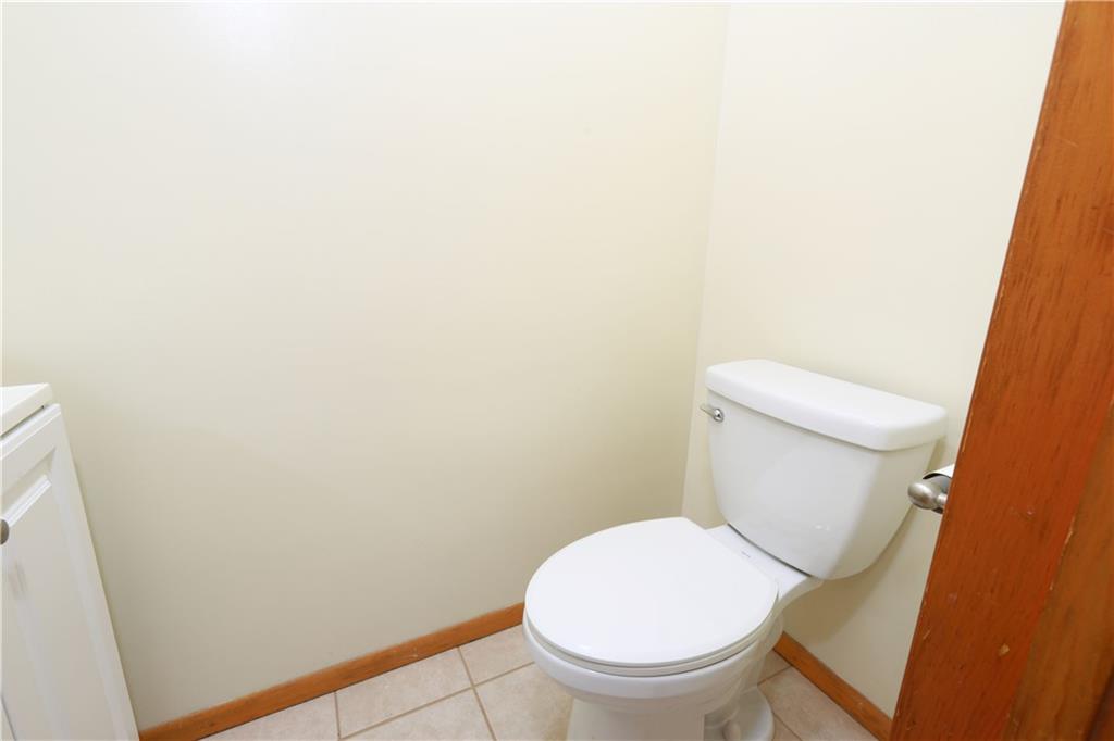 1311 19th Avenue Beaver Falls, PA 15010 - Photo 21 of 40 a white toilet sitting next to a white wall