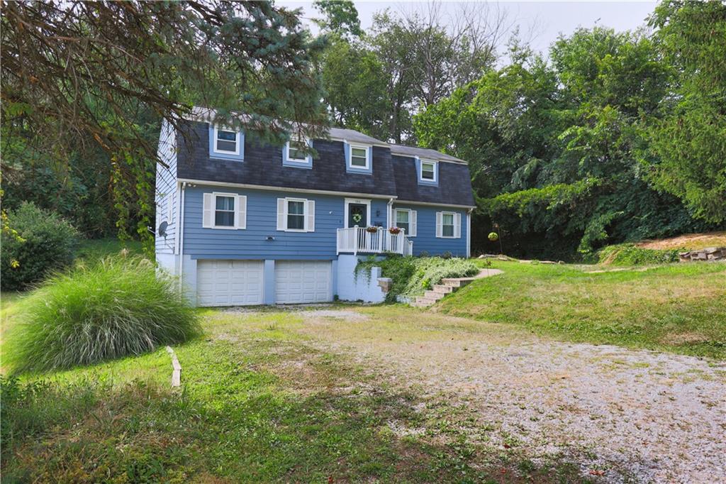 1311 19th Avenue Beaver Falls, PA 15010 - Photo 3 of 40 a view of a house with a yard and potted plants