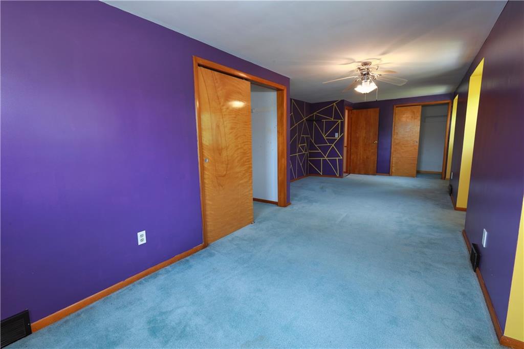 1311 19th Avenue Beaver Falls, PA 15010 - Photo 32 of 40 an empty room with closet and wooden floor