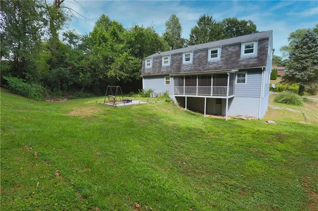 a view of a backyard with a garden