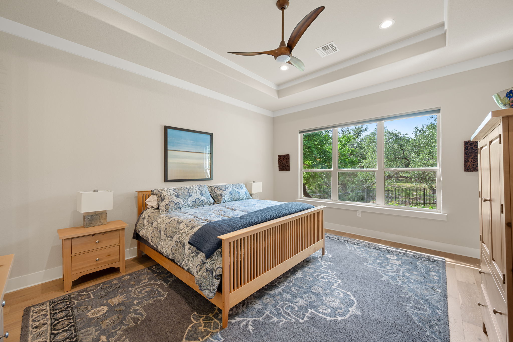 212 Marbella Way Georgetown, TX 78633 - Photo 18 of 40 a bedroom with a bed and a window