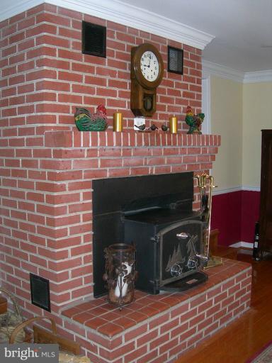 4640 Bucks School House Road Rosedale, MD 21237 - Photo 2 of 29 Fireplace with wood burning insert