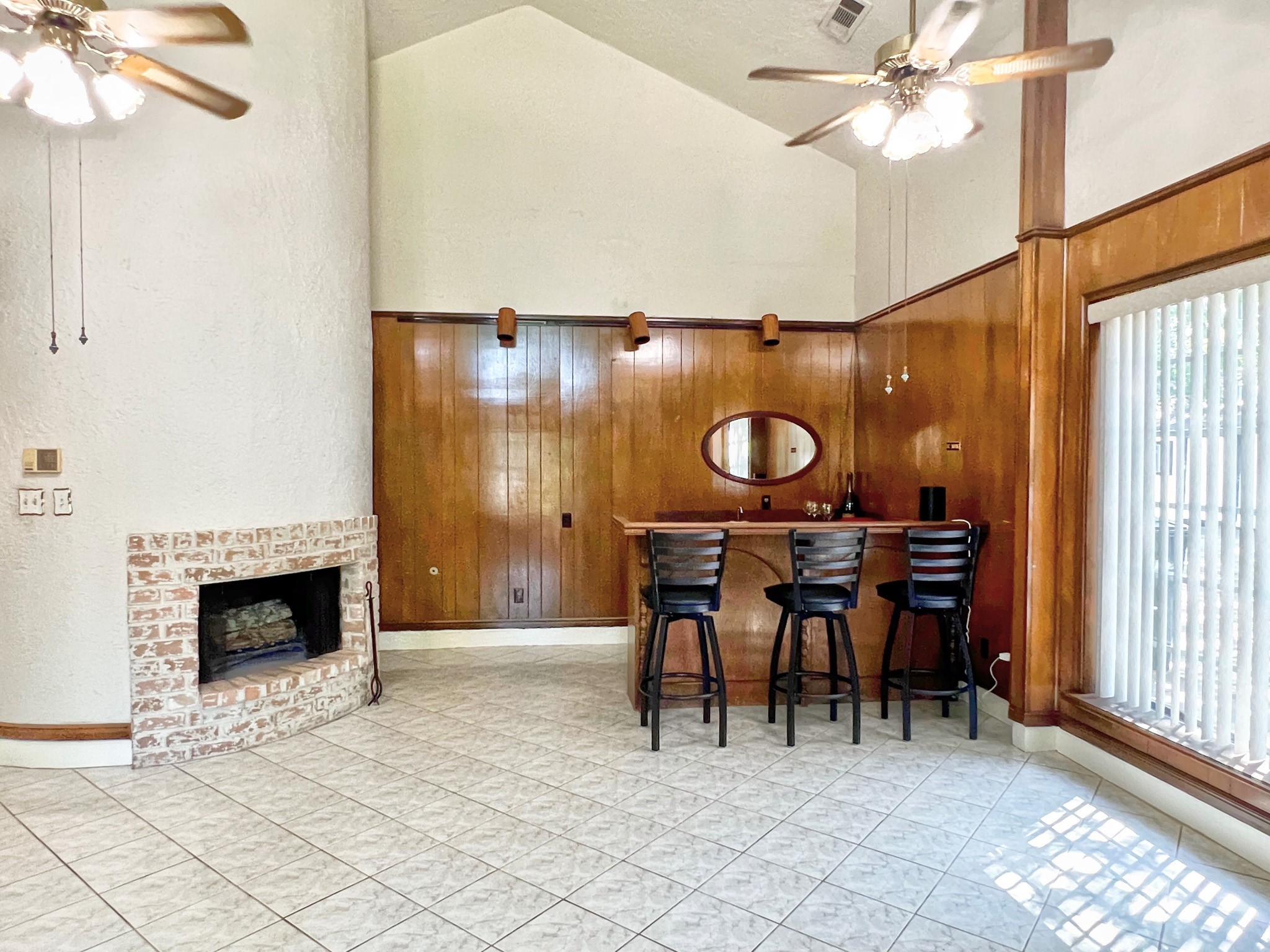 16902 Summit Oaks Lane Spring, TX 77379 - Photo 15 of 49 a view of a livingroom with furniture and chandelier fan