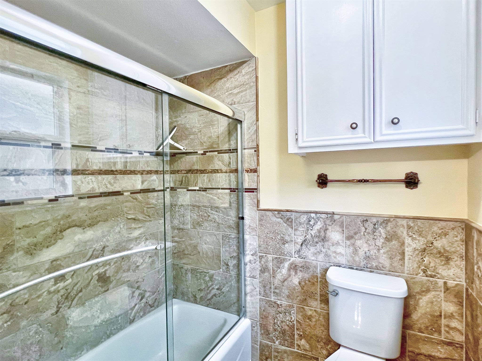 16902 Summit Oaks Lane Spring, TX 77379 - Photo 36 of 49 a bathroom with a toilet and a shower