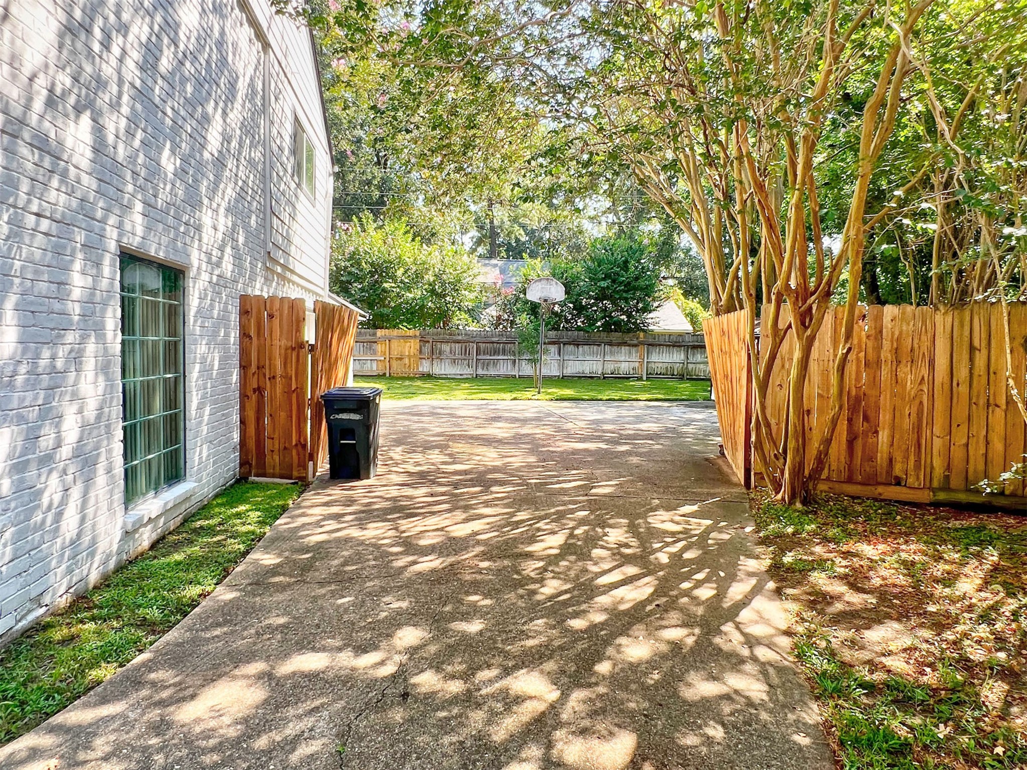 16902 Summit Oaks Lane Spring, TX 77379 - Photo 46 of 49 a view of backyard with tree
