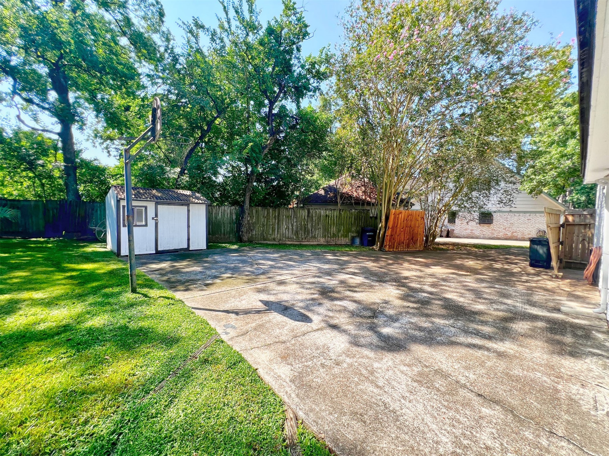 16902 Summit Oaks Lane Spring, TX 77379 - Photo 47 of 49 a front view of a house with a yard and trees