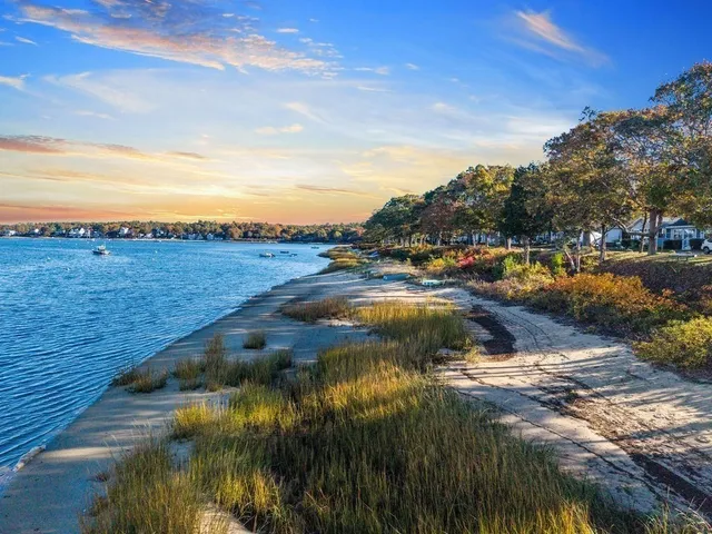 a view of residential houses with outdoor space