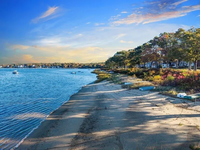 a view of an ocean with city