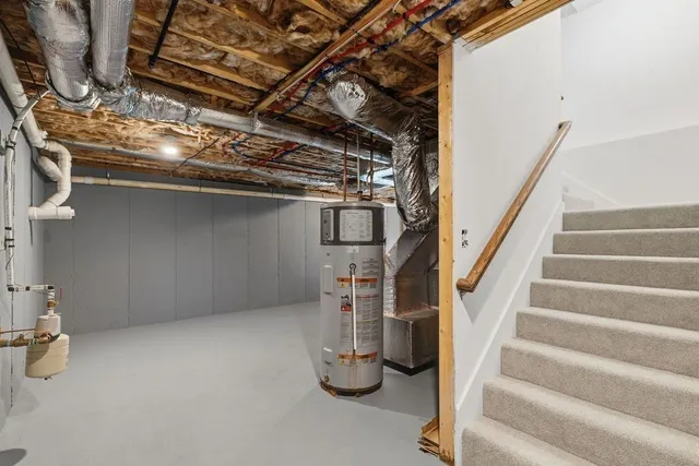 a view of a room with wooden walls