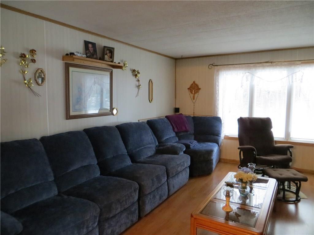 11 Country Lane Road Madawaska, ME 04756 - Photo 7 of 25 Sun-filled living room which opens...