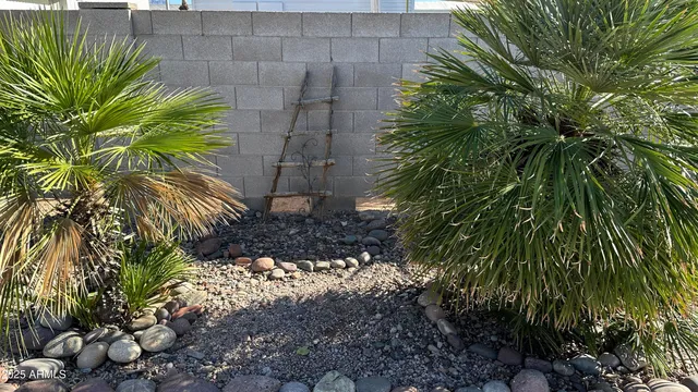 a kitchen with stainless steel appliances a sink a stove top oven a refrigerator and dishwasher