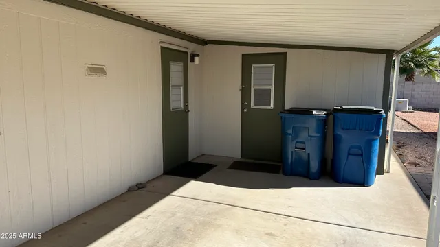 a kitchen with granite countertop a sink stove and refrigerator