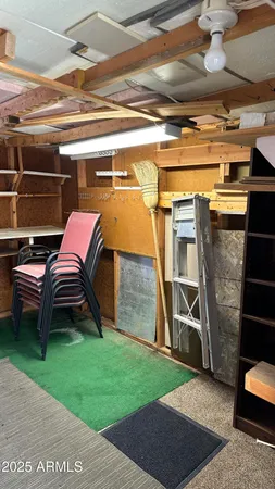 a backyard with table and chairs