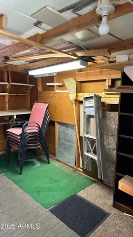 a backyard with table and chairs