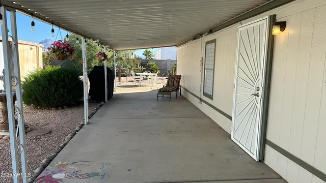a view of room with outdoor seating and stairs