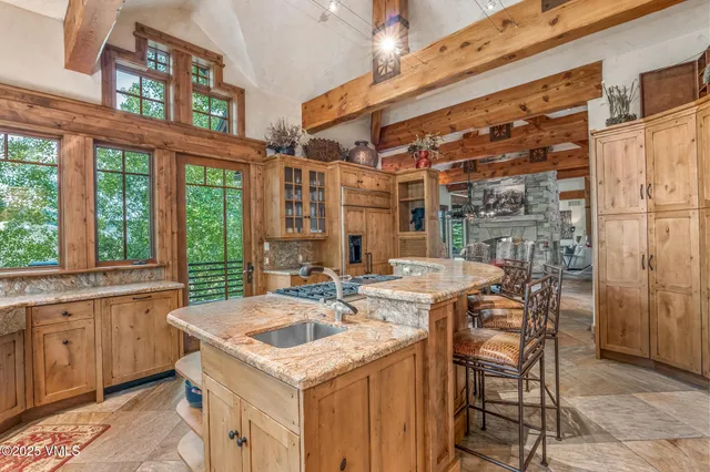 a living room with a couch and a fireplace