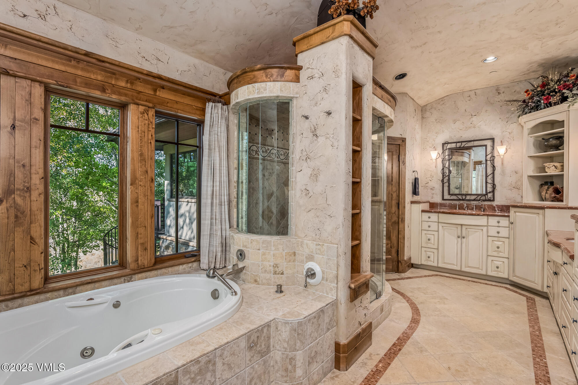 135 Andorra Road Edwards, CO 81632 - Photo 30 of 82 a bathroom with a granite countertop tub sink and mirror