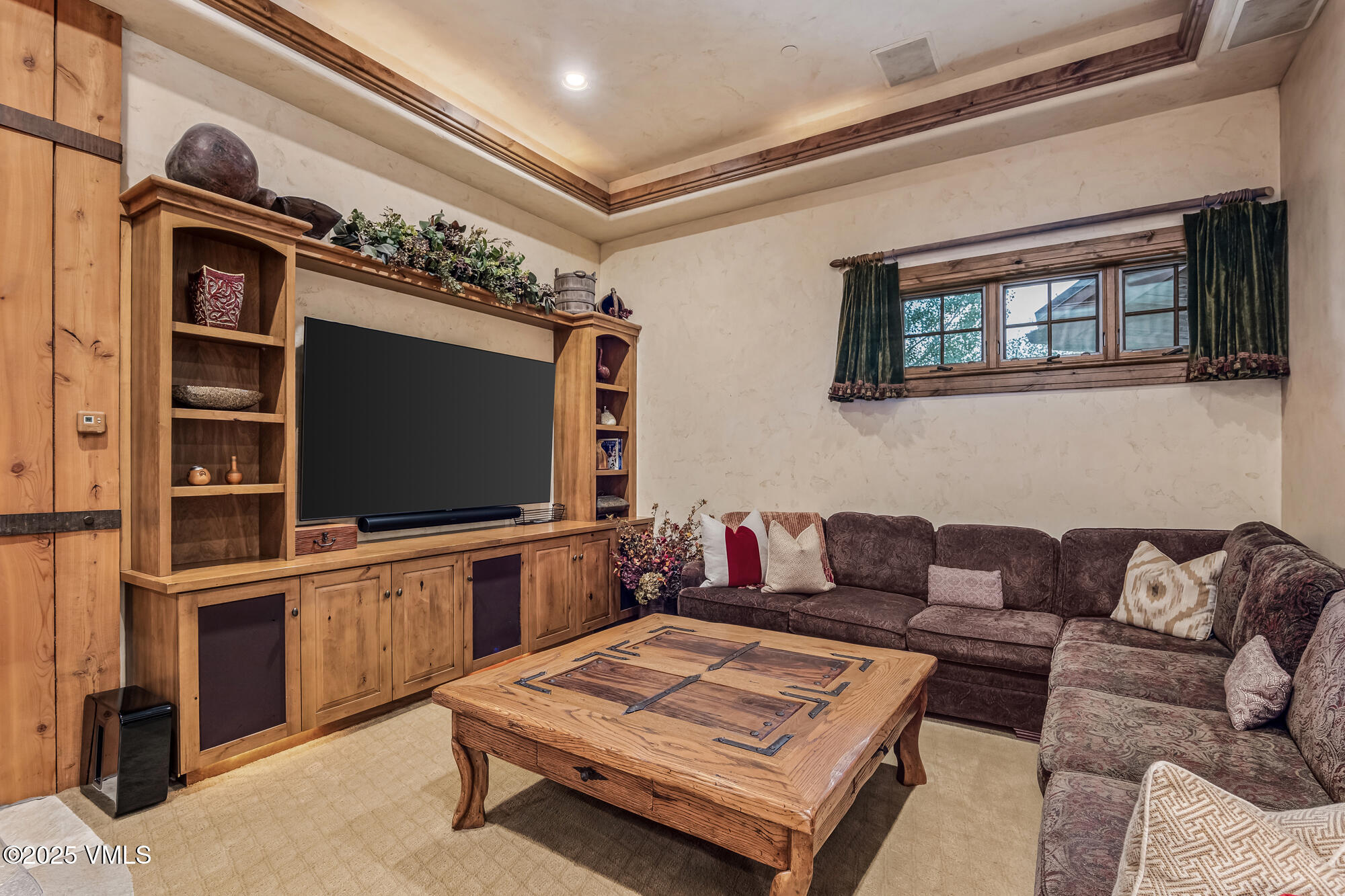 135 Andorra Road Edwards, CO 81632 - Photo 35 of 82 a living room with furniture and a flat screen tv