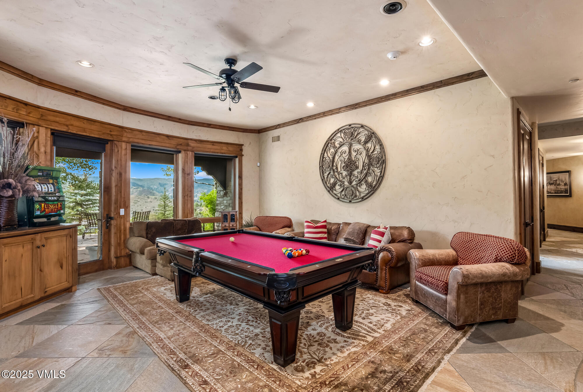 135 Andorra Road Edwards, CO 81632 - Photo 40 of 82 a living room with furniture a table and a large window