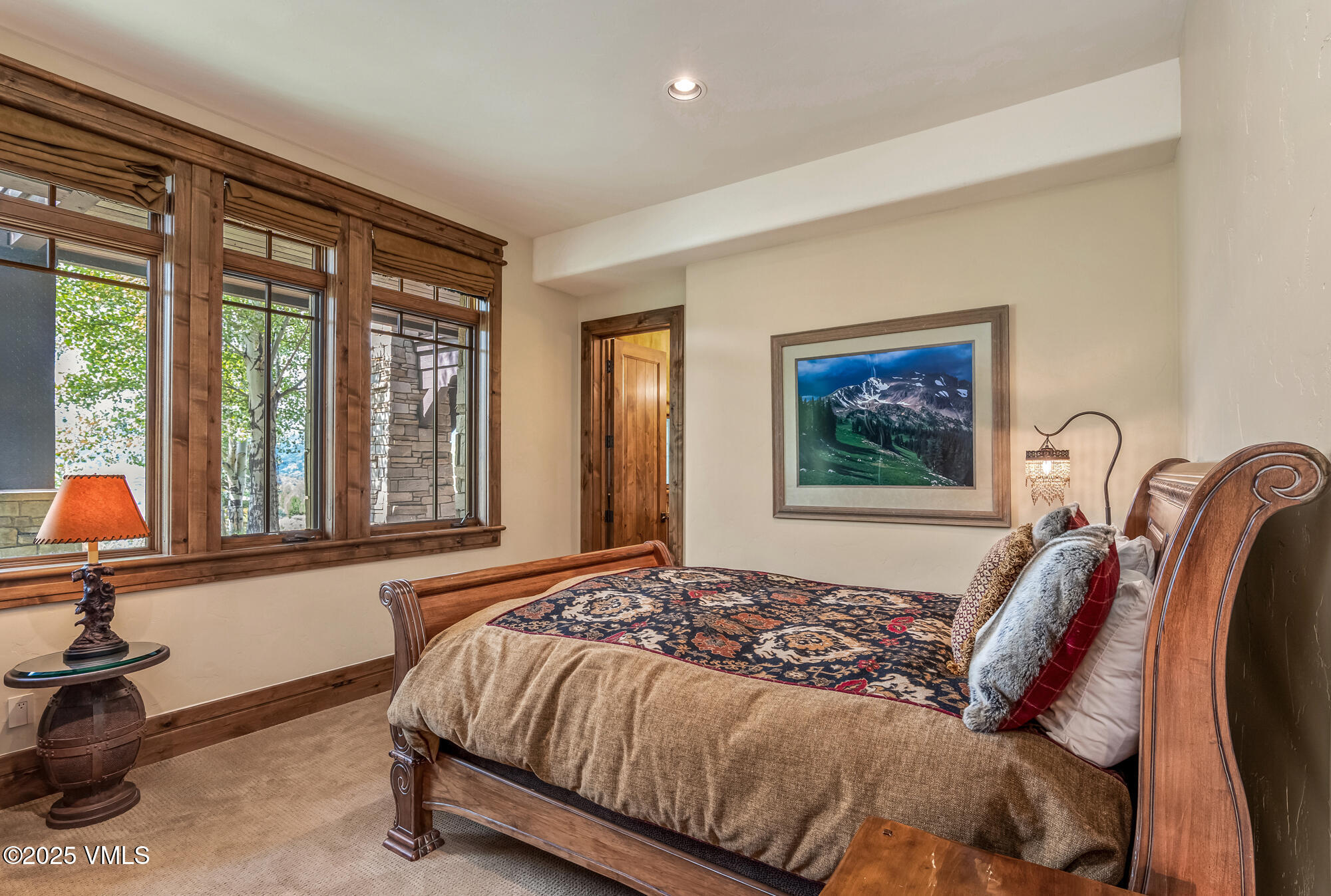 135 Andorra Road Edwards, CO 81632 - Photo 44 of 82 a bed sitting in a bedroom next to a window