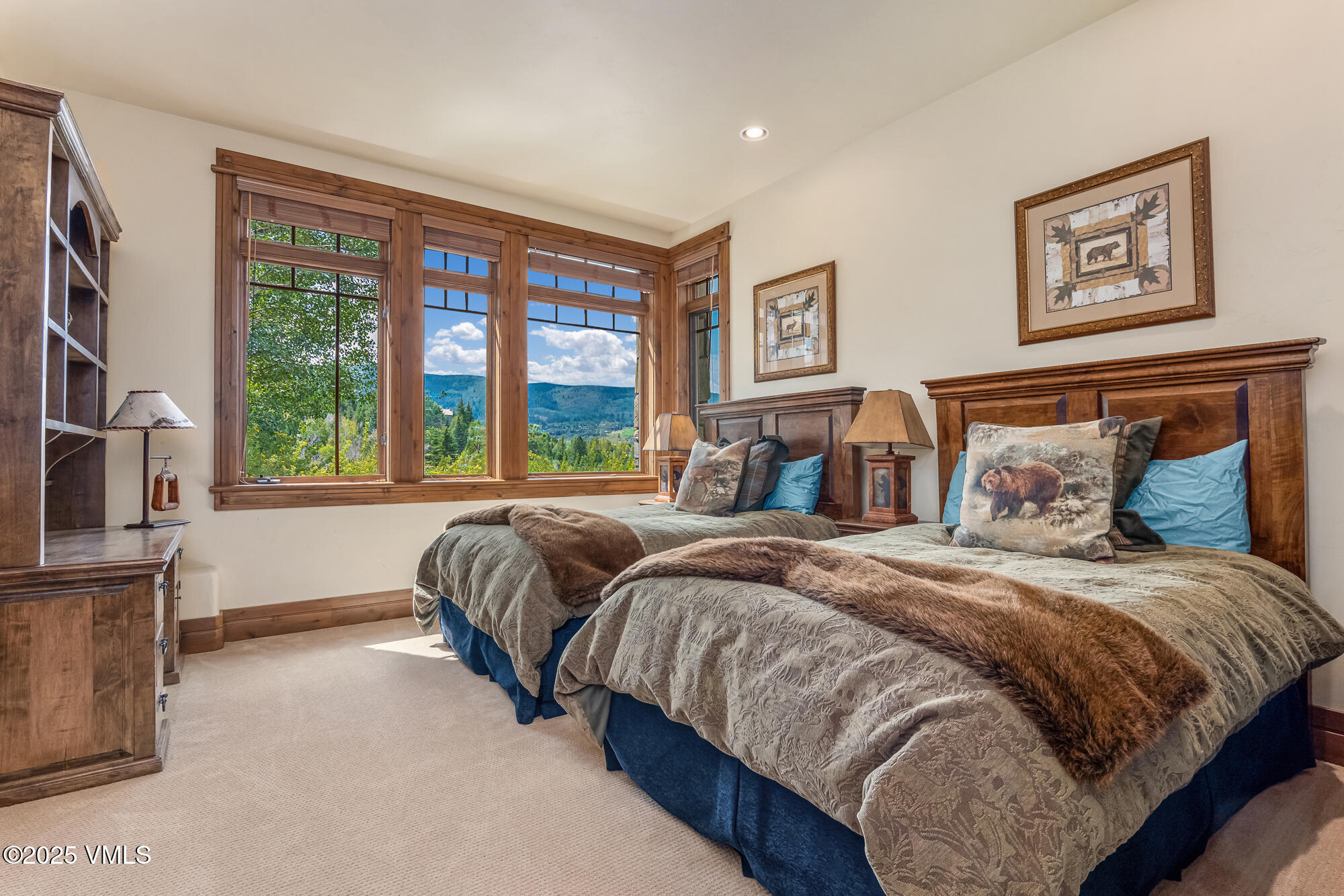 135 Andorra Road Edwards, CO 81632 - Photo 45 of 82 a bedroom with a bed and a large window