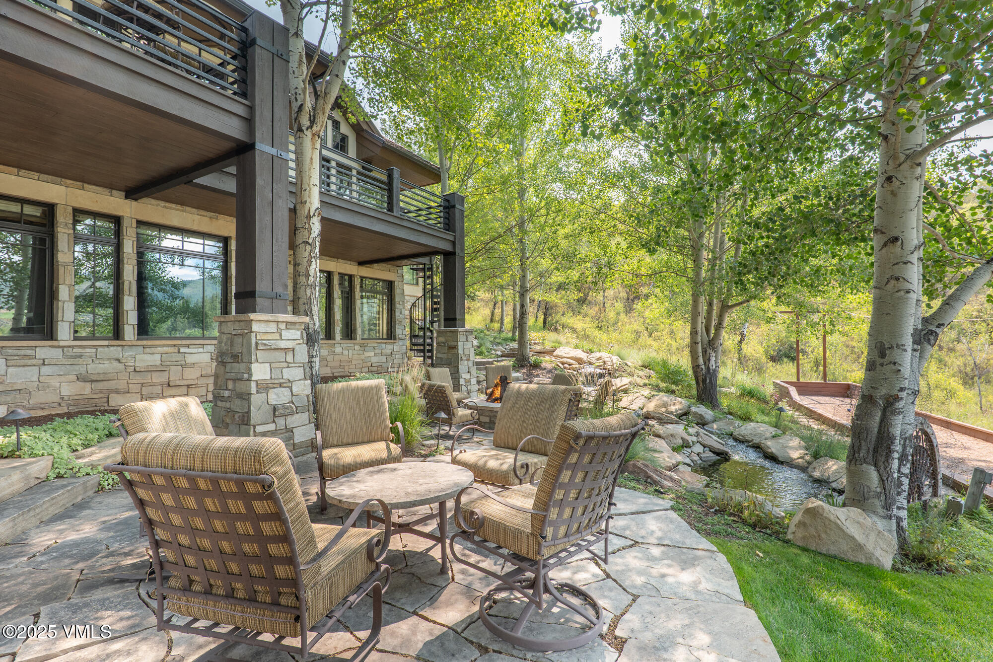 135 Andorra Road Edwards, CO 81632 - Photo 50 of 82 a view of a patio with a table and chairs